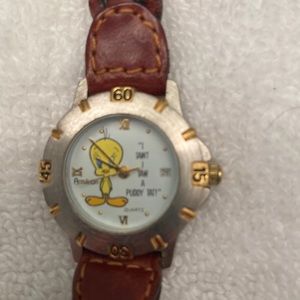 Tweety bird watch with braided brown leather band.